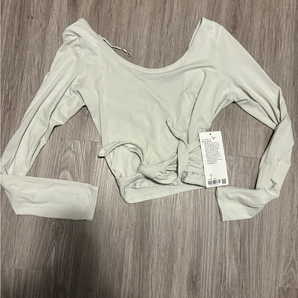 Lululemon it’s a tie long sleeve
